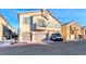 Two-story townhome with attached garage and balcony at 4710 Blaise Ave # 101, North Las Vegas, NV 89084