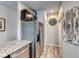 Stainless steel refrigerator and granite countertops in kitchen at 4710 Blaise Ave # 101, North Las Vegas, NV 89084