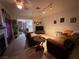 Living area with brown sectional sofa and view of kitchen at 508 Sarajane Ln, Las Vegas, NV 89107