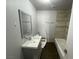 Updated bathroom with tub and vanity at 520 S 13Th St # D4, Las Vegas, NV 89101