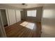 Bedroom with wood-look floors and double closets at 520 S 13Th St # D4, Las Vegas, NV 89101