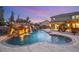 Freeform pool with grotto and slide; a true oasis at 6004 Chessington Ave, Las Vegas, NV 89131