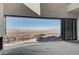 Stunning panoramic views from expansive windows in this open concept interior at 607 Grand Rim Dr, Henderson, NV 89012