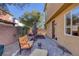 Private backyard oasis with patio and seating area at 634 Wounded Star Ave, Las Vegas, NV 89178