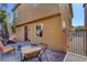 Relaxing backyard patio with seating area and brick pavers at 634 Wounded Star Ave, Las Vegas, NV 89178