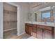 Double vanity bathroom with walk-in closet at 634 Wounded Star Ave, Las Vegas, NV 89178