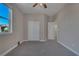 Well-lit bedroom with double closets and ceiling fan at 634 Wounded Star Ave, Las Vegas, NV 89178