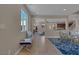 Bright dining area with glass table and modern rug at 634 Wounded Star Ave, Las Vegas, NV 89178