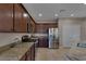 Modern kitchen with stainless steel appliances and granite countertops at 634 Wounded Star Ave, Las Vegas, NV 89178