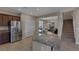 Gourmet kitchen boasts stainless steel appliances and large island at 634 Wounded Star Ave, Las Vegas, NV 89178