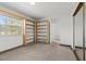 Bright bedroom featuring built-in shelving and a neutral color palette at 656 Tam O Shanter, Las Vegas, NV 89109