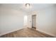 Bright bedroom with wood-look flooring and a closet at 6750 Laronda Ln, Las Vegas, NV 89156