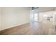 Open living room with view into kitchen area at 6750 Laronda Ln, Las Vegas, NV 89156