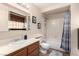 Clean bathroom with a shower/tub combo and vanity at 6885 Tamarus St # 201, Las Vegas, NV 89119