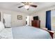 Spacious bedroom with a double bed and ceiling fan at 6885 Tamarus St # 201, Las Vegas, NV 89119