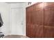 Entryway with wood-toned closet and tile floor at 6885 Tamarus St # 201, Las Vegas, NV 89119