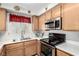 Stainless steel appliances in this kitchen at 6885 Tamarus St # 201, Las Vegas, NV 89119