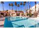 Inviting community pool with ample lounge chairs at 6885 Tamarus St # 201, Las Vegas, NV 89119