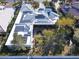 Aerial view of home with solar panels and pool at 7436 Oak Grove Ave, Las Vegas, NV 89117