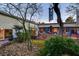 Secluded courtyard with native plants and wind chimes at 7436 Oak Grove Ave, Las Vegas, NV 89117