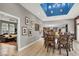 Bright dining room with hardwood floors and unique ceiling at 7436 Oak Grove Ave, Las Vegas, NV 89117