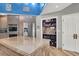 Modern kitchen with granite countertops, stainless steel appliances, and a built-in bar at 7436 Oak Grove Ave, Las Vegas, NV 89117