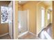 Bathroom with walk-in shower and tile flooring at 7491 Speedwell Cavern St, Las Vegas, NV 89139