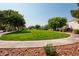 Landscaped green space with gazebo and playground at 7491 Speedwell Cavern St, Las Vegas, NV 89139