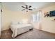 King bedroom with ceiling fan and carpeted floor at 7700 Tierra Montanosa Ave, Las Vegas, NV 89179