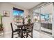 Breakfast nook with sliding glass doors leading to backyard at 7700 Tierra Montanosa Ave, Las Vegas, NV 89179