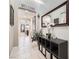 Bright entryway with tile floors and a decorative console table at 7700 Tierra Montanosa Ave, Las Vegas, NV 89179