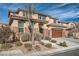 Two-story house with stone accents and desert landscaping at 7700 Tierra Montanosa Ave, Las Vegas, NV 89179