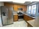 Updated kitchen with stainless steel appliances and granite countertops at 7732 Beverly Hills Dr, Las Vegas, NV 89147