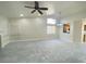 Bright living room with tile floors and high ceilings at 7732 Beverly Hills Dr, Las Vegas, NV 89147