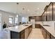 Modern kitchen with large island and stainless steel appliances at 859 Benning St, Henderson, NV 89011