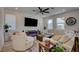 Living room with sectional sofa, coffee table, and fireplace at 859 Benning St, Henderson, NV 89011