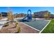 Modern playground with rubber surface, slide, and climbing structure at 859 Benning St, Henderson, NV 89011