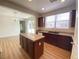 Kitchen with granite countertops and wood cabinets at 8970 College Green St, Las Vegas, NV 89148