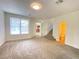 Spacious living room with stairs and powder room at 8970 College Green St, Las Vegas, NV 89148