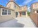 Spacious patio adjacent to a two-story house at 8970 College Green St, Las Vegas, NV 89148