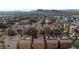 Aerial view of numerous townhouses in a residential community, showcasing the neighborhood's layout at 9378 Hilgard Ave, Las Vegas, NV 89178