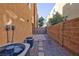 Small backyard with paved patio and gravel at 9378 Hilgard Ave, Las Vegas, NV 89178