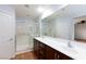 Modern bathroom with double vanity and large shower at 9378 Hilgard Ave, Las Vegas, NV 89178