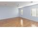 Living room with hardwood floors and light walls at 9378 Hilgard Ave, Las Vegas, NV 89178