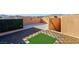 Spacious rooftop deck with artificial turf and mountain views at 9378 Hilgard Ave, Las Vegas, NV 89178