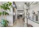 Bright entryway with glass shelves and a view into the living area at 9635 Stoney Mesa Ct, Las Vegas, NV 89139