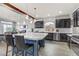 Spacious kitchen with large island and dark wood cabinets at 9635 Stoney Mesa Ct, Las Vegas, NV 89139