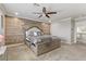 Main bedroom with wood-like wall and large bed at 9635 Stoney Mesa Ct, Las Vegas, NV 89139