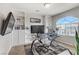 Home office featuring built-in shelves and a large window at 9635 Stoney Mesa Ct, Las Vegas, NV 89139