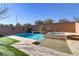 Relaxing pool and spa with stone accents at 9635 Stoney Mesa Ct, Las Vegas, NV 89139